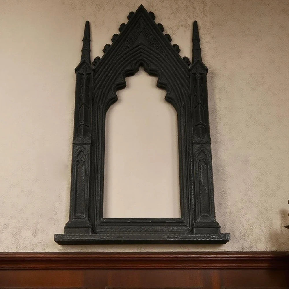 miroir gothique noir orné pointes décoration murale foncé sculpté