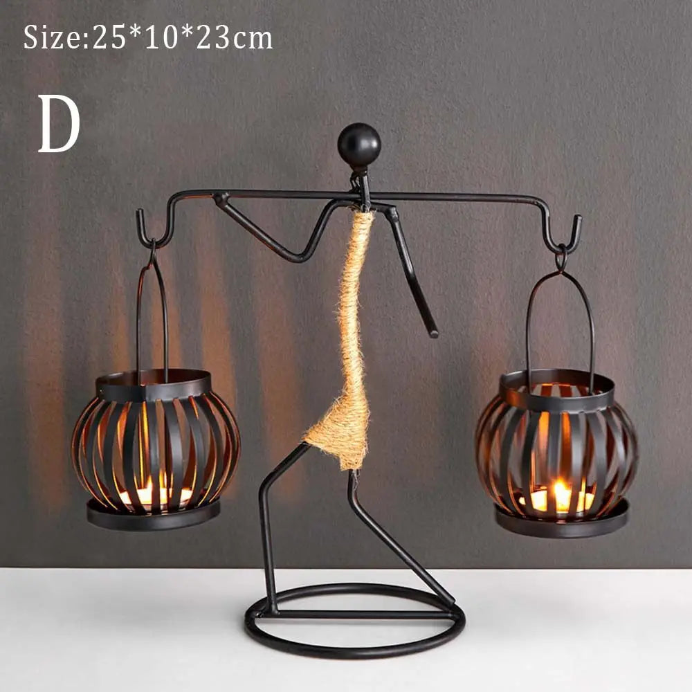 lanterne moderne minimaliste métal noir suspension bougie décoration intérieure contemporain porte chandelier abstrait