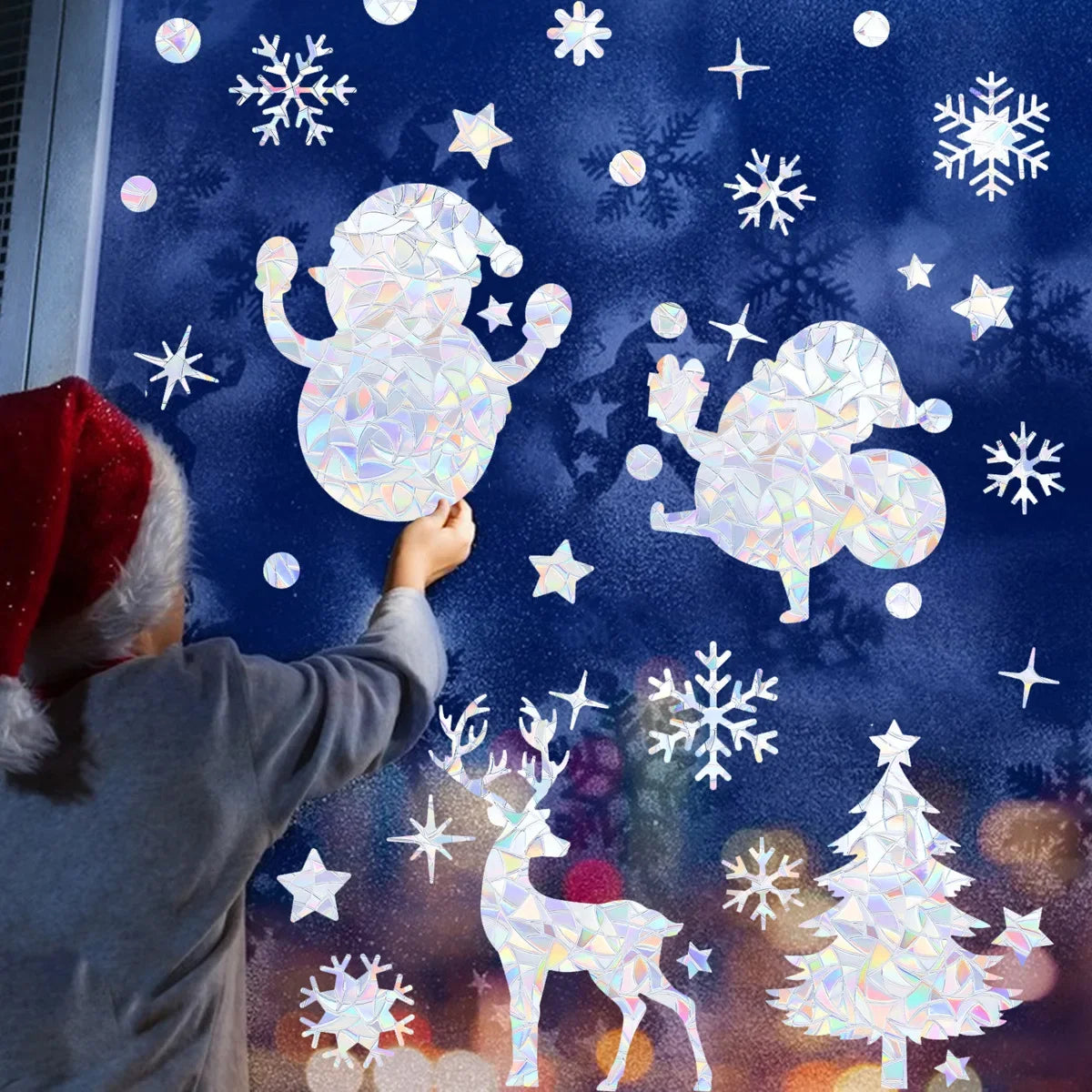 Décoration fenêtre avec autocollants wapiti et père Noël
