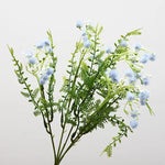 décoration intérieure bouquet artificiel feuilles vertes fleurs blanches jaunes roses naturel salon jardin