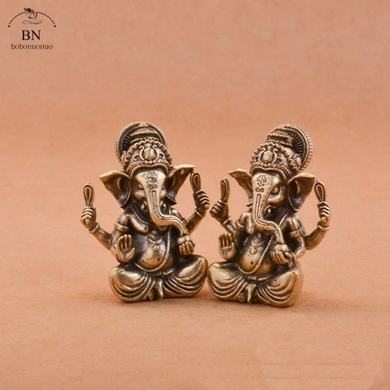 statuette ganesha bronze doré sculptée details complexes religieuse traditionnelle décoration intérieure éléphant dieuhindou ornement