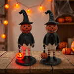figurine halloween citrouille orange visage chapeau robe bas suspendue noire