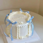 gâteau résine rose blanc motif floral rubans classique photo décoration anniversaire mẫu giả trưng
