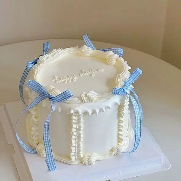 gâteau résine rose blanc motif floral rubans classique photo décoration anniversaire mẫu giả trưng