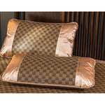 matelas sommeil rotin bambou beige marron carreaux géométriques coussins lit double