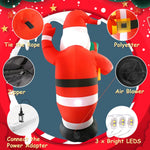 Père Noël gonflable en cours de gonflage avec ventilateur intégré
