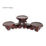 présentoir bois sculpté chinois plateformes circulaires vases céramique fleur séchée bouddha pierre