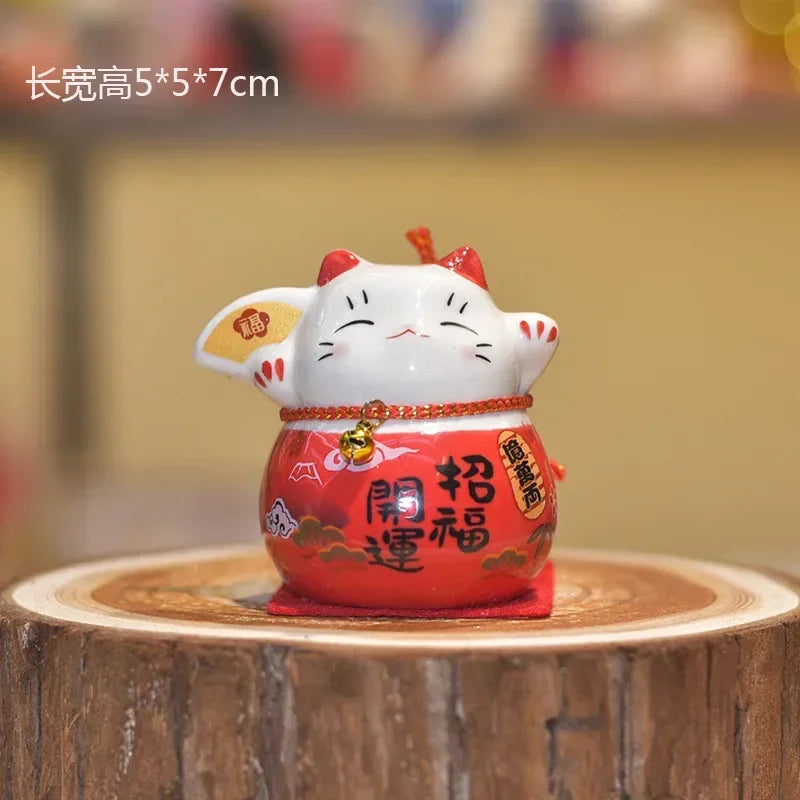 chat souriant tirelire céramique japonaise motifs floraux couleur rouge vert rose bleu jaune