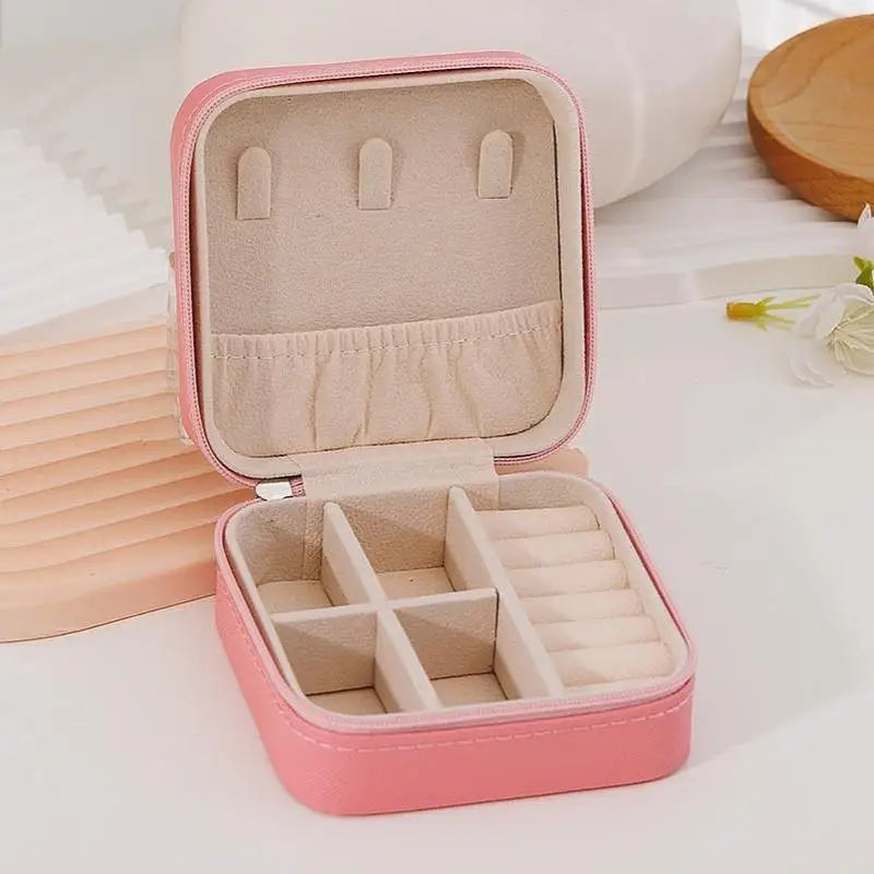 boîte bijoux simili cuir zippée compartiments moderne vert blanc noir rose beige