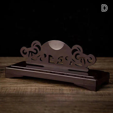 présentation éventail pliant traditionnel rouge rose jaune noir motifs floraux géométriques support bois sculpté