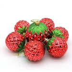 Décoration de Noël rouge brillante forme fraise