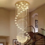 Suspension lumineuse moderne cristal transparente salon chambre étude 2000 82000 flux lumineux