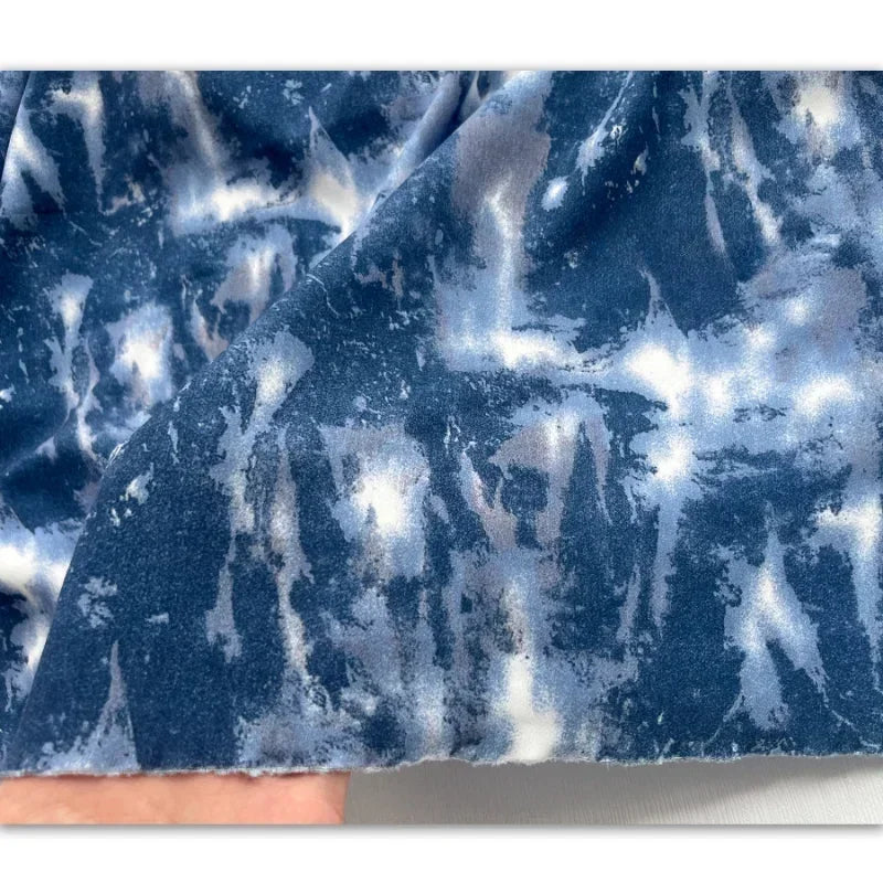 tissu polyester tie dye marbré bleu marine blanc protection uv moderne artistique 140cm