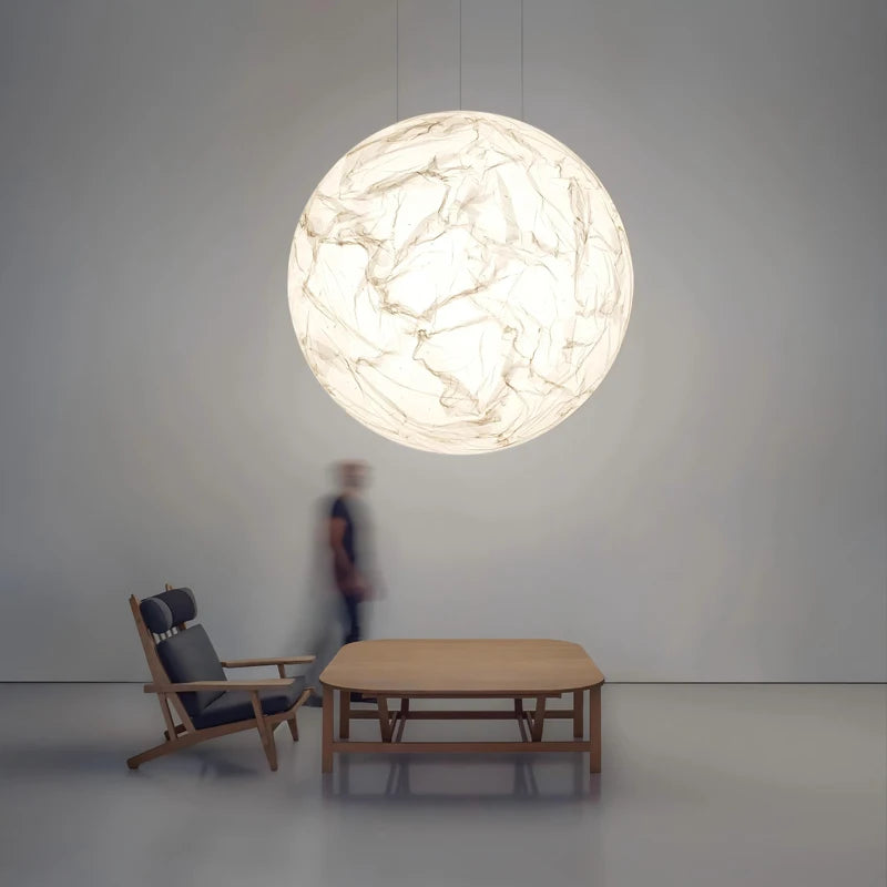 suspension lumineuse moderne marbrée blanc beige câble suspendu salon chambre restaurant