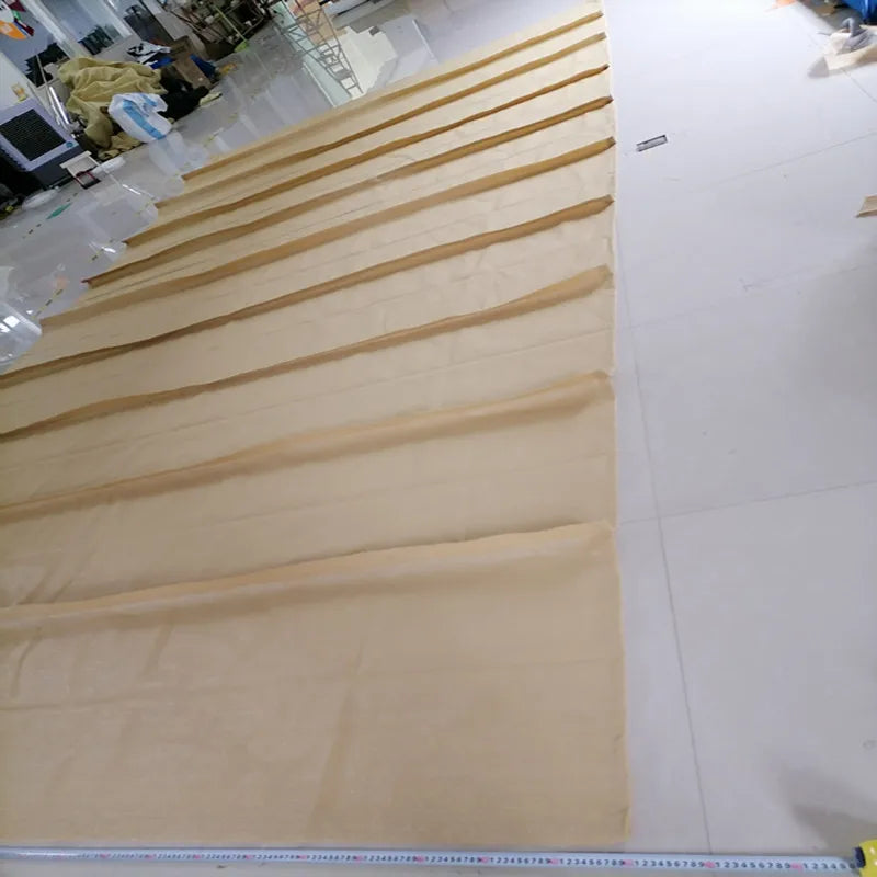 Détail du système de rétraction par câble de la voile d'ombrage