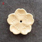 support bâtonnets encens fleurs stylisées artisanal rose bleu vert jaune blanc