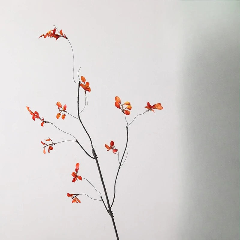 décoration extérieure branche artificielle feuilles rouge orange verte naturelle minimaliste