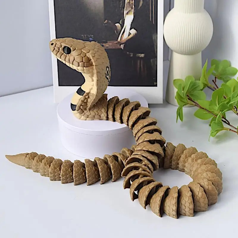 jouet serpent articulé marron noir réelle 33cm décoratif imitations écailles texturées éléments fleurs livres