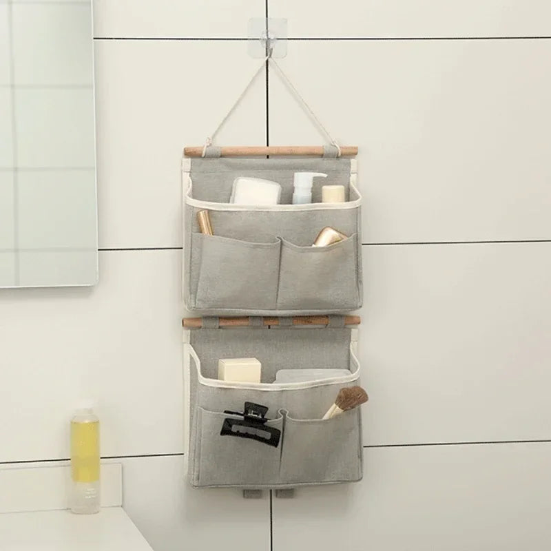 sac rangement mural gris toile coton clips adhésifs compartiments poignées bois moderne