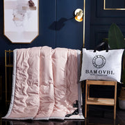 couette rose motifs carreaux quilting bordure contrastante taie doreiller sac inclusion luxueux chambrehôtel