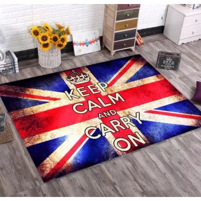 Tapis décoratif avec le drapeau britannique et le texte "Keep Calm and Carry On" en rouge et or.