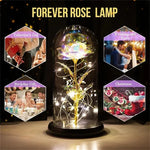 lampe led rose stabilisée dorée feuilles vertes moderne nuit multicolore base noire verre transparent
