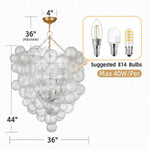 suspension lumineuse moderne élégante transparente billes dorées effet bulles chaîne métallique chambre salon étude