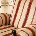 fauteuil rembourré moderne scandinave assise rayée couleur marron rouille coussins pieds apparents