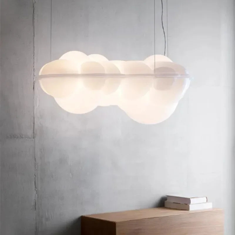 luminaire suspendu nuage moderne sphères lumineuses transparence partielle minimaliste fixations câbles métalliques