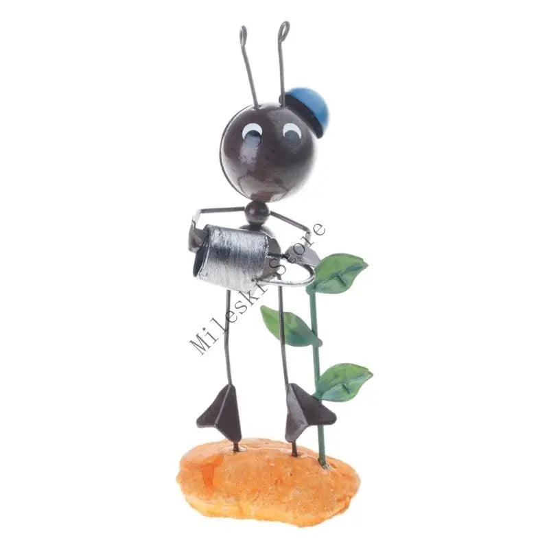 figurine métallique jardin feuilles fleurs décor extérieur moderne artisanal noir bleu vert orange blanc