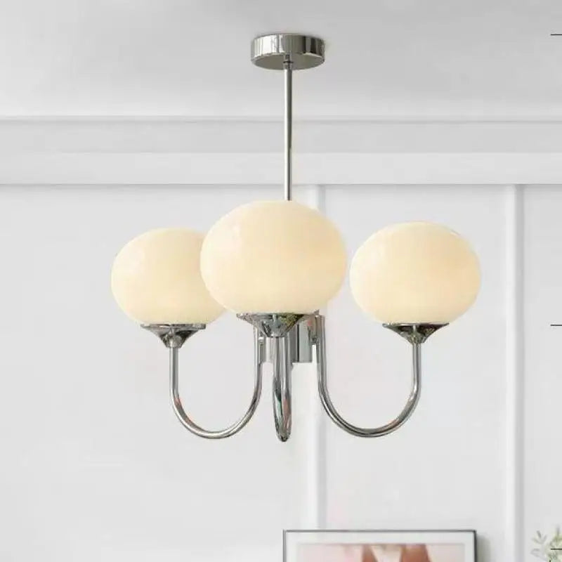 lustre moderne ampoules sphériques doré blanc rose translucides finition brillante minimaliste
