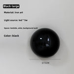 lampe led sphère lumineuse moderne minimaliste argentée dorée noire brillante opaque adhésif
