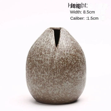 petit vase céramique artisanale décoratif gris marron texture rugueuse fleur artificielle maison moderne