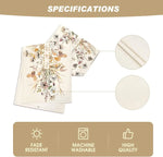 Tissu d'ameublement fleuri beige et blanc avec des spécifications indiquant une résistance à la décoloration, un lavage en machine et une haute qualité.