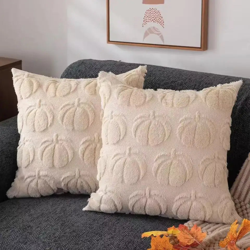 coussins carrés vert clair beige rose pâle texture tissée pompons moderne fermeture glissière