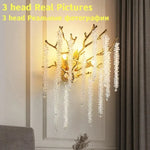 lampe murale moderne or branches cristal transparentes chambre salon led aluminium