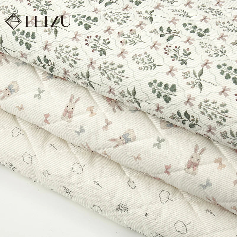 tissu imprimé fleurs lapins blanc rose vert bleu clair vintage enfantin résistant déchirure bricolage
