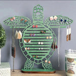 porte bijoux tortue verte bois clair ajouré motifs horizontaux naturel marin suspendu