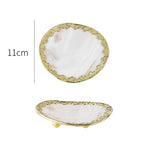 assiettes bijoux blanc or élégantes motifs floraux texture naturelle pieds métalliques almacenamiento joyas