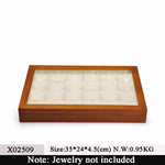 boîte rangement bijoux bois gris foncé classique motif géométrique opacité adhésif plaque cuir anniversaire