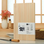 planche découper bois clair rectangle emballage papier blanc couteau manche bois clair panier tressé