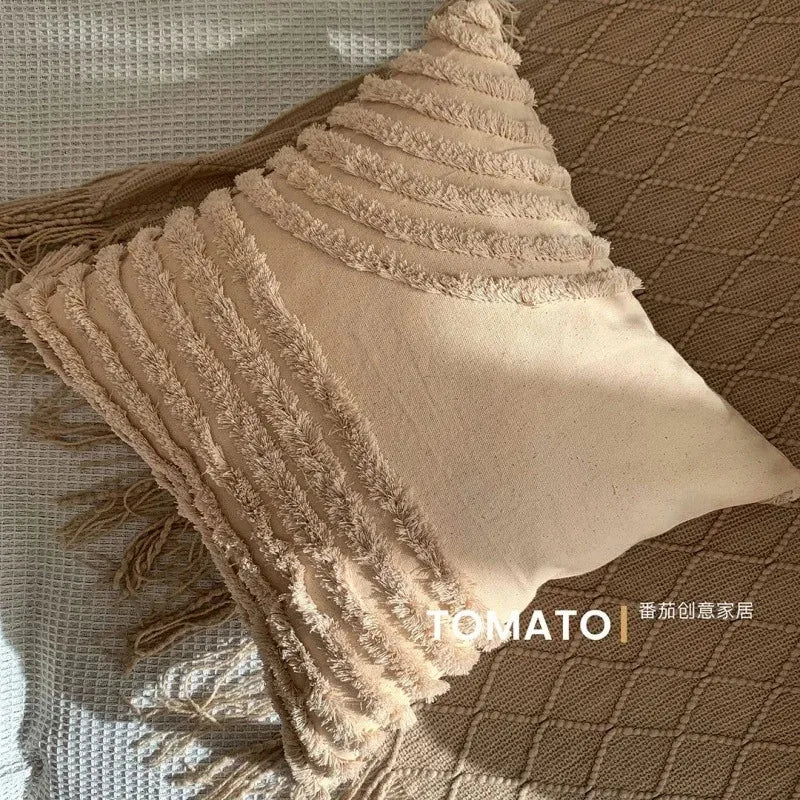 taies d'oreiller géométriques brodées boho chic couleurs beige orange gris franges respectueuses environnement decoration