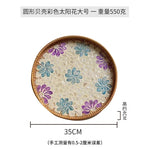 plateau rond rotin coquillages feuilles naturelles décoration boho assiette fruits pain petit déjeuner