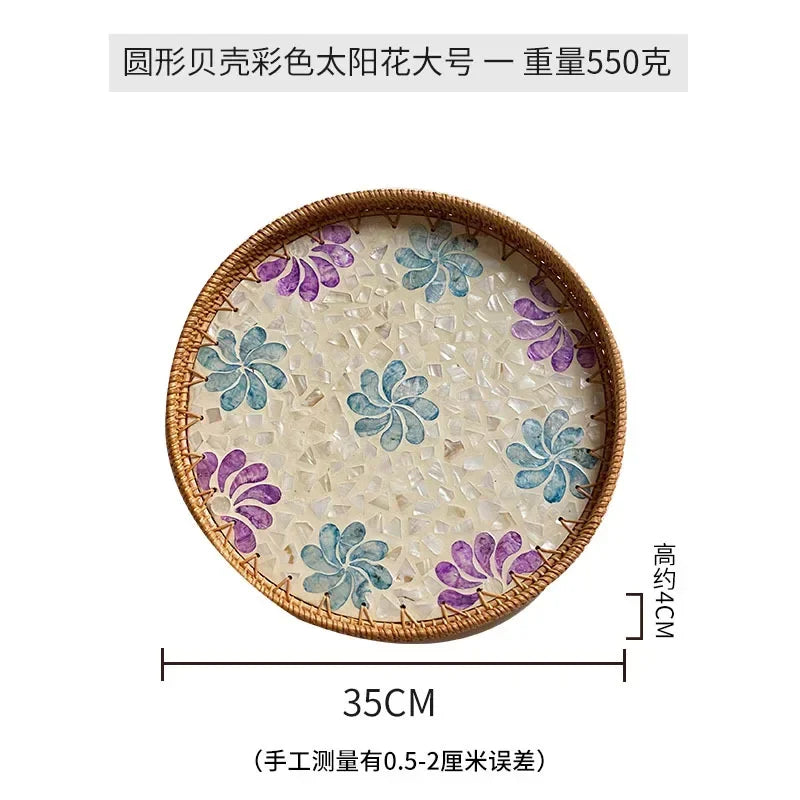plateau rond rotin coquillages feuilles naturelles décoration boho assiette fruits pain petit déjeuner