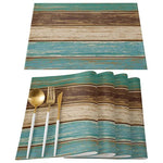 tapis table moderne rustique bleu brun beige rayures horizontales assiettes cuillères fourchettes couteaux verres