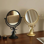 miroir table rotatif or noir rose poudré élégant vintage rubans crèmes aromathérapie