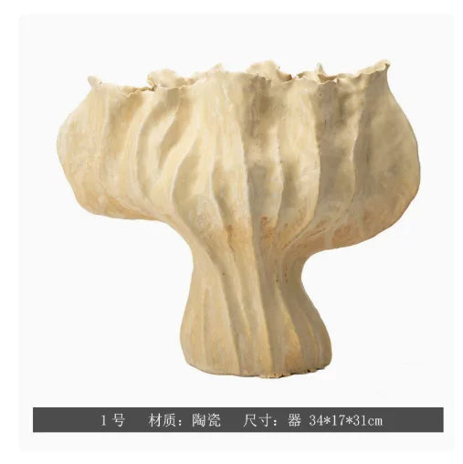 vase moderne porcelaine rose pâle ondulé décoration maison salon arrangement floral