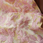 tissu polyester floral relief rose jaune semi transparent largeur 155cm respectueux environnement decoratif Jacquard