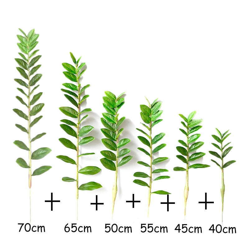 plantes artificielles branches vertes feuilles simples extérieur moderne pot blanc exposé