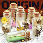 bouteilles verre transparentes bouchon liège charms huiles essentielles coquillages